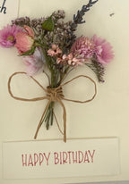 Greeting card with dried flowers and 'Happy Birthday'
